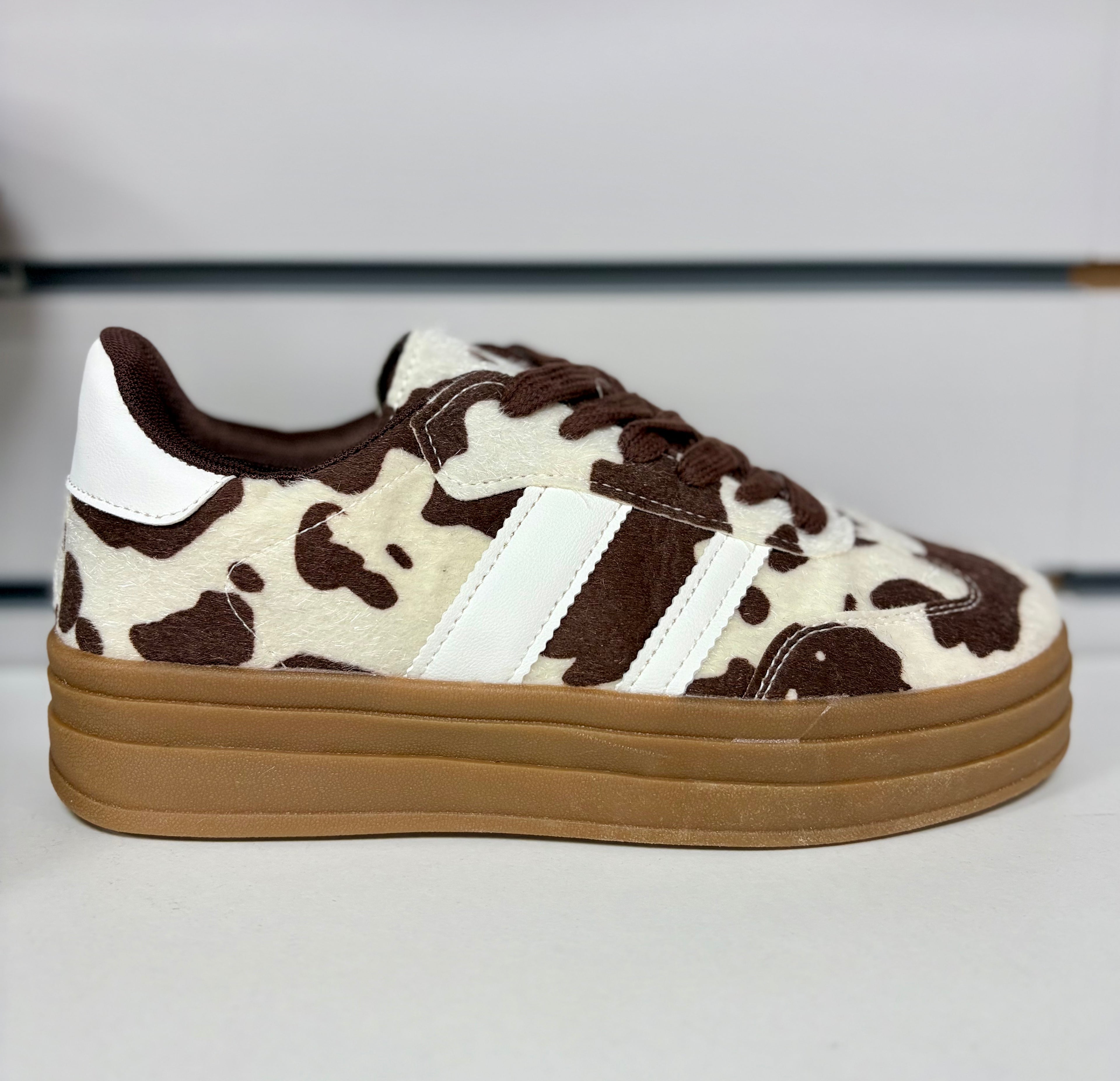 Ladies brown/cream cow print Platform trainers