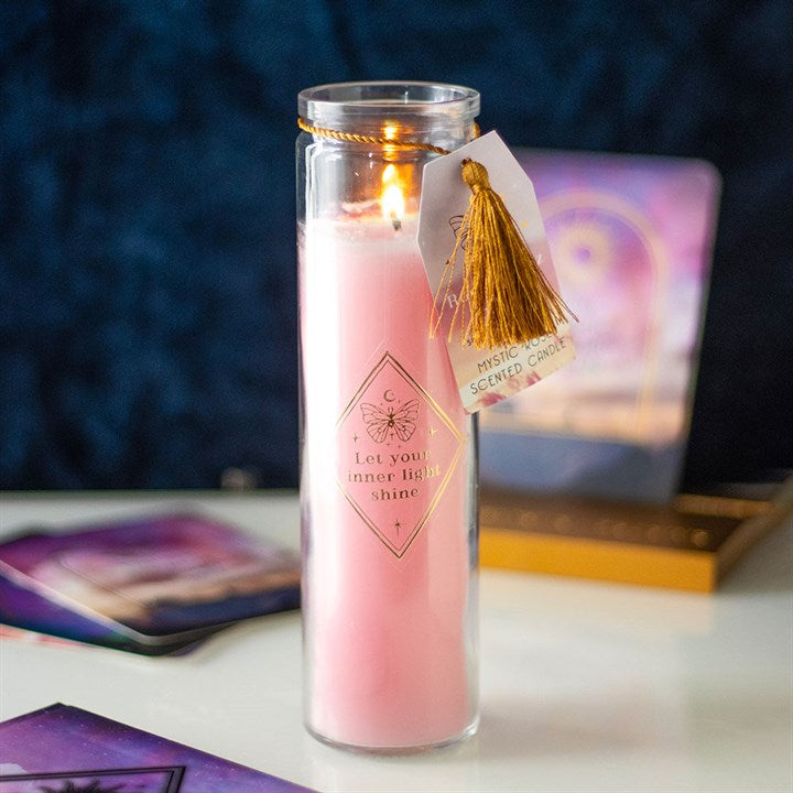 Inspired by traditional 7-day prayer candles, this tube candle comes in a beautiful mystical rose fragrance. Accented with gold ‘Let your inner light shine' text and rose quartz crystal chips, this candle promotes self-love and confidence. Crystals will release from wax with use and can be reused for a multitude of spiritual purposes. Paraffin wax. Approximately 50 hours of burn time.

