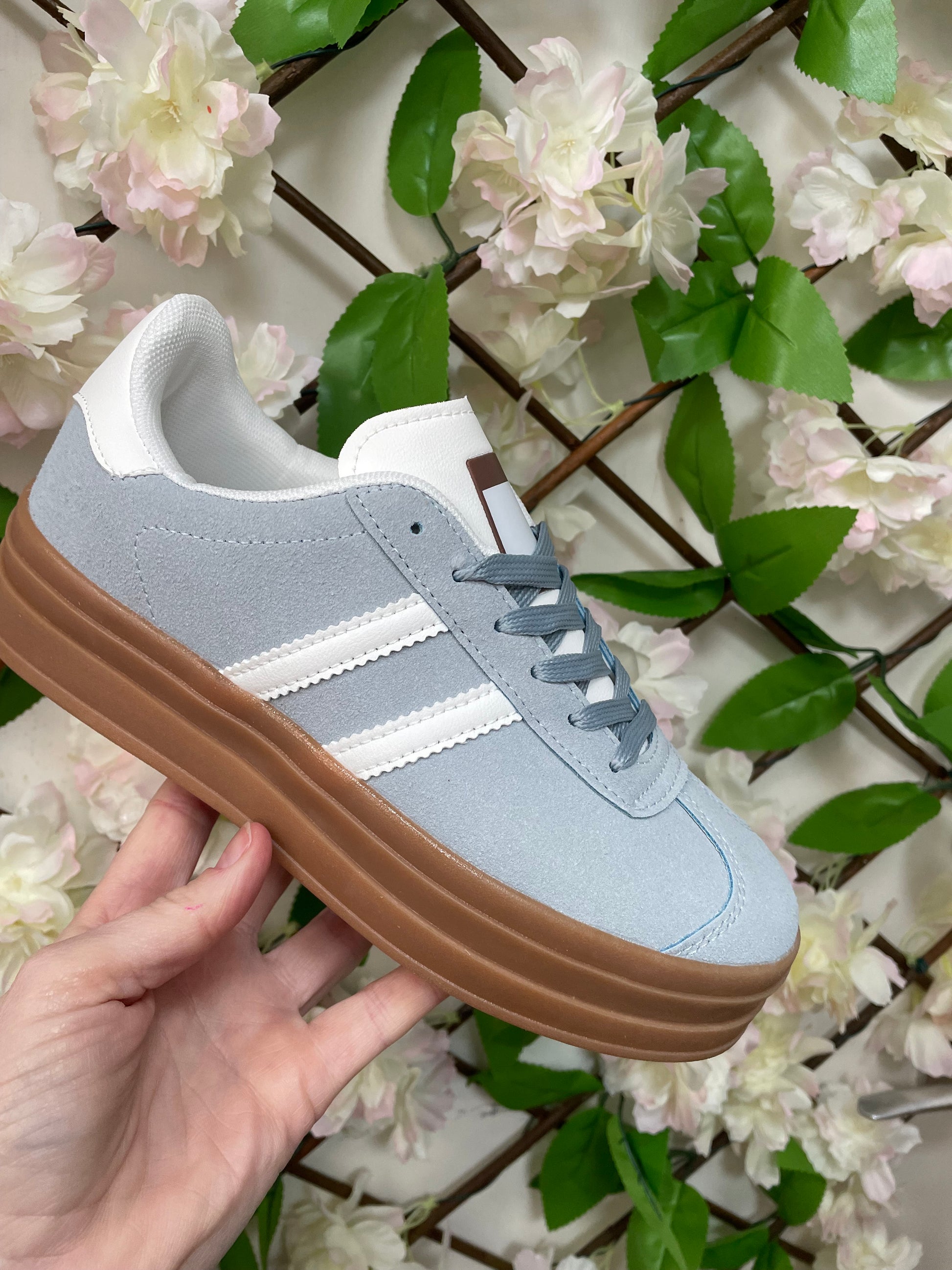 Platform trainers are so on trend right now! Our Mia trainers are perfect for this season, featuring a two stripe detail on the side. Style with some jeans and a t-shirt to complete the look.