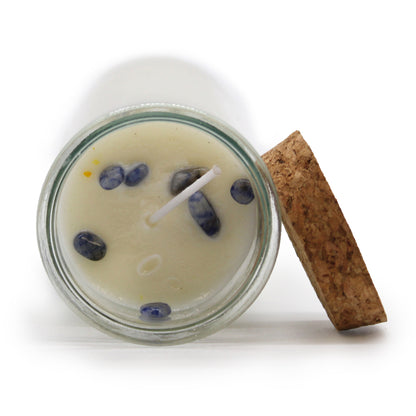 What is your Magic Spell Candle - Protection for? -  To create a shield of divine protection, ward off negative energies, and create a safe and harmonious space. To safeguard your energy, promote spiritual well-being, and instil a sense of security. Embedded within the candle, you will discover genuine Sodalite, known as the stone of peace and protection, promoting mental clarity, intuition, and shielding against negative energies. The captivating scent of Dragon Blood, known for its powerful protective and