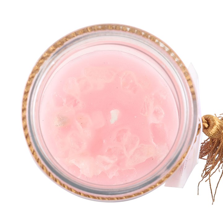 Inspired by traditional 7-day prayer candles, this tube candle comes in a beautiful mystical rose fragrance. Accented with gold ‘Let your inner light shine' text and rose quartz crystal chips, this candle promotes self-love and confidence. Crystals will release from wax with use and can be reused for a multitude of spiritual purposes. Paraffin wax. Approximately 50 hours of burn time.

